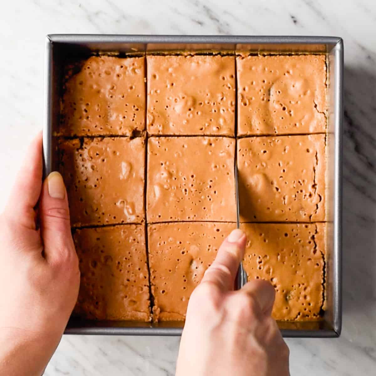 breakfast bars being cut into 9 squares