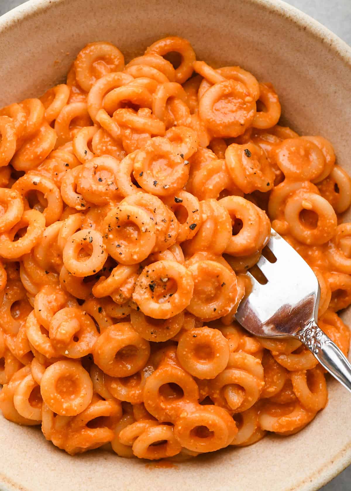 up close photo of Homemade Spaghetti Os with a fork