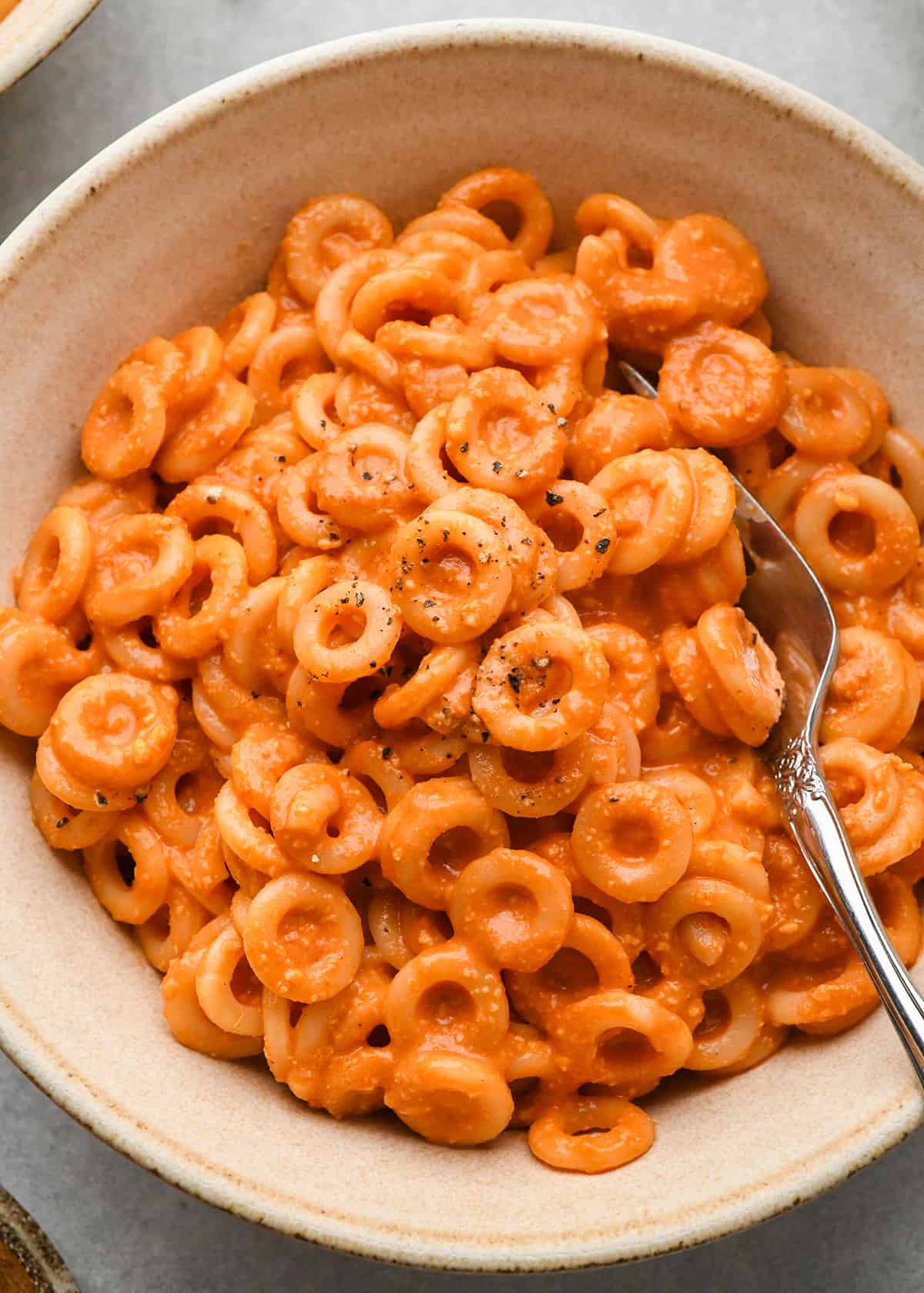 Homemade Spaghetti Os in a bowl with a fork