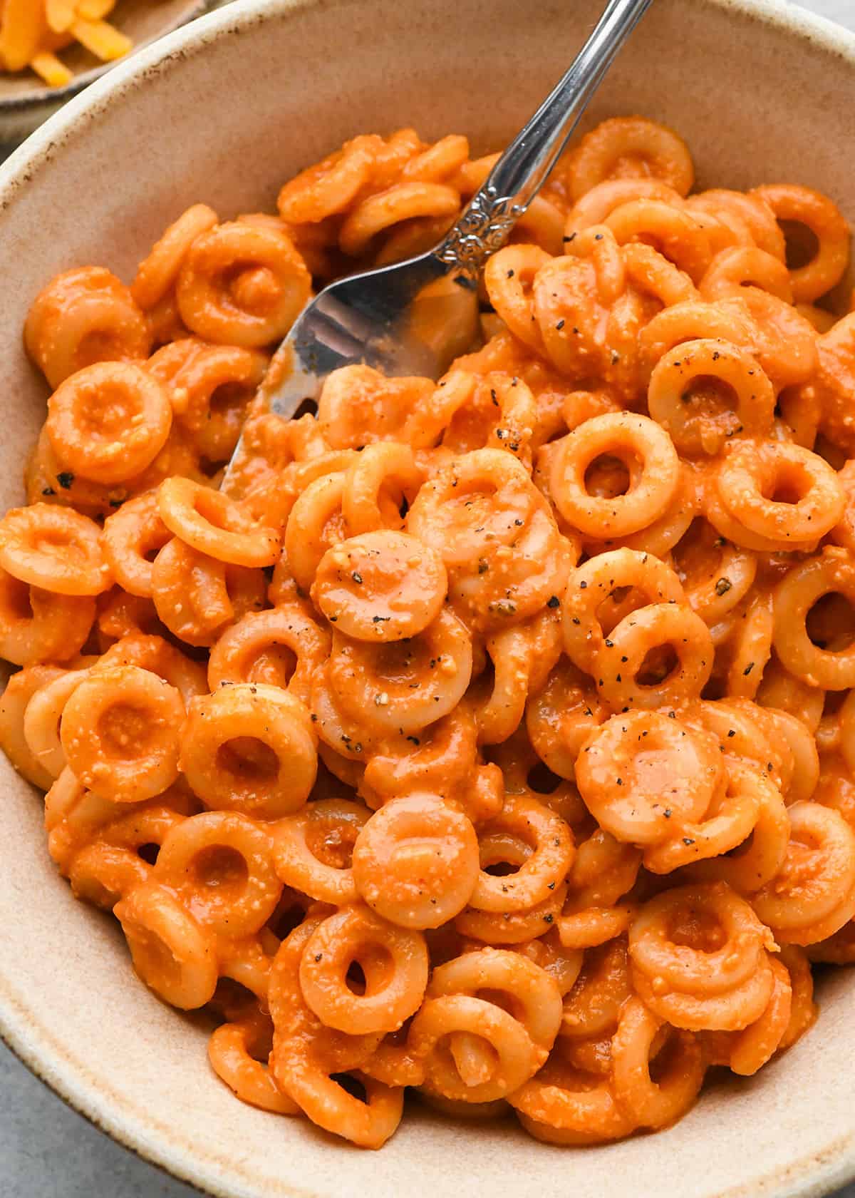 Homemade Spaghetti Os in a bowl with a fork