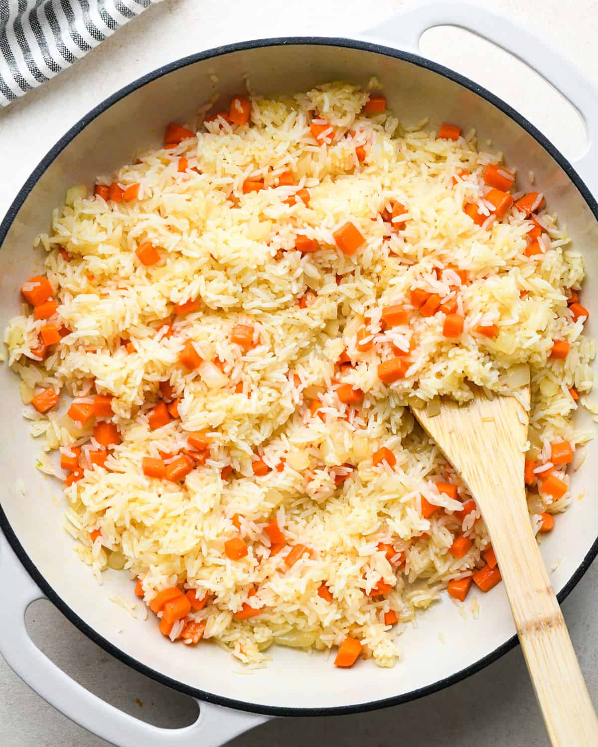 How to Make Fried Rice - after mixing rice into the vegetables in a pan