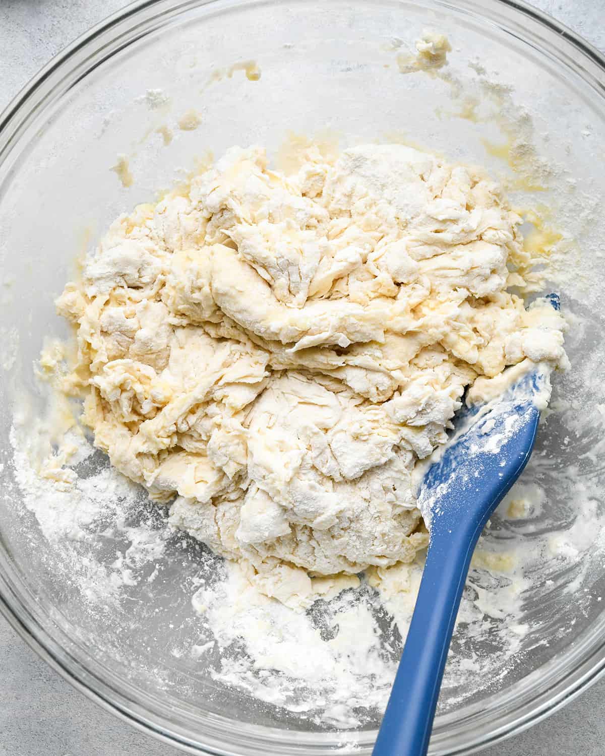 How to Make Pizza stirring dough