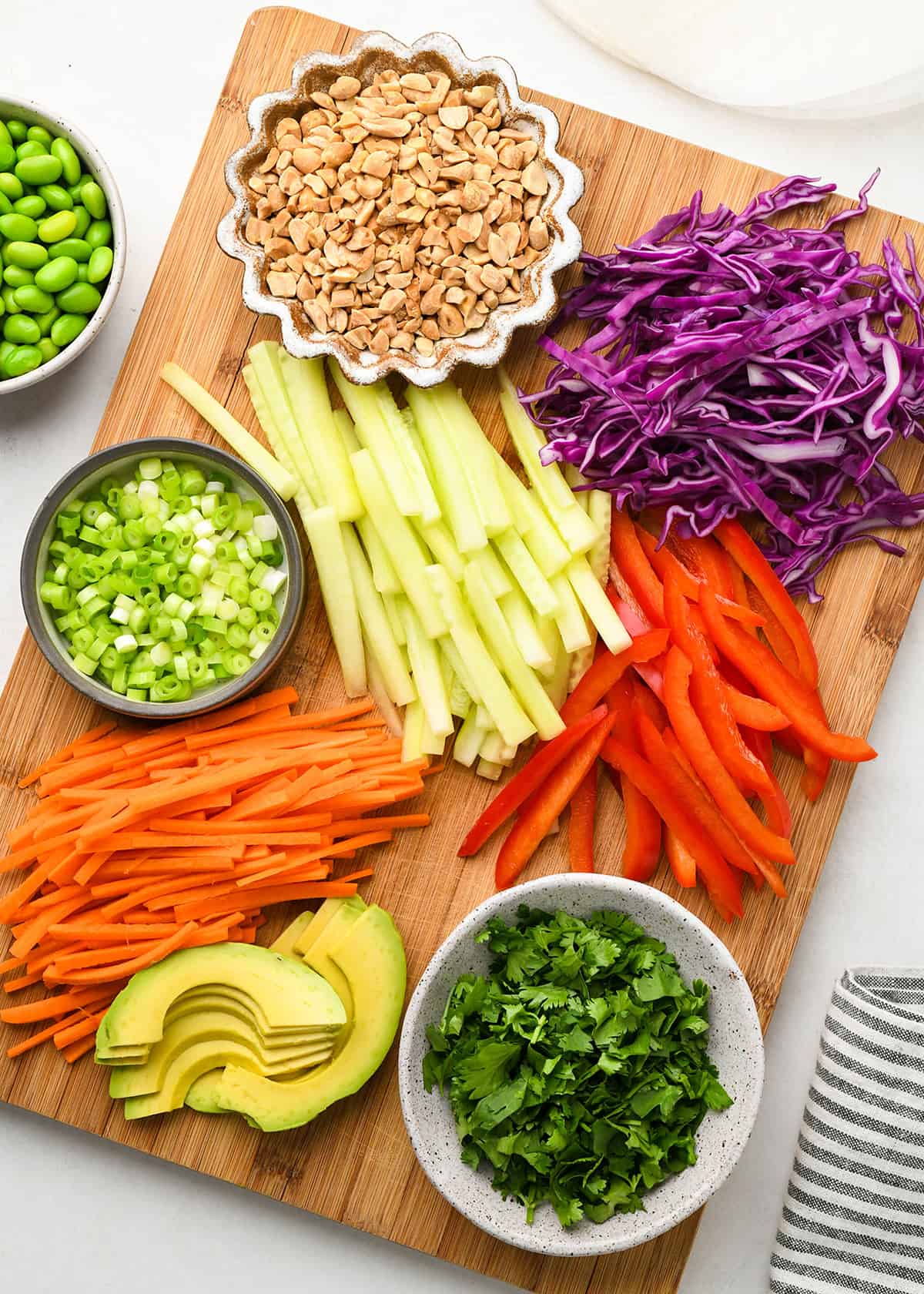 overhead view of the ingredients in this spring roll recipe laid out on a cutting board ready to use