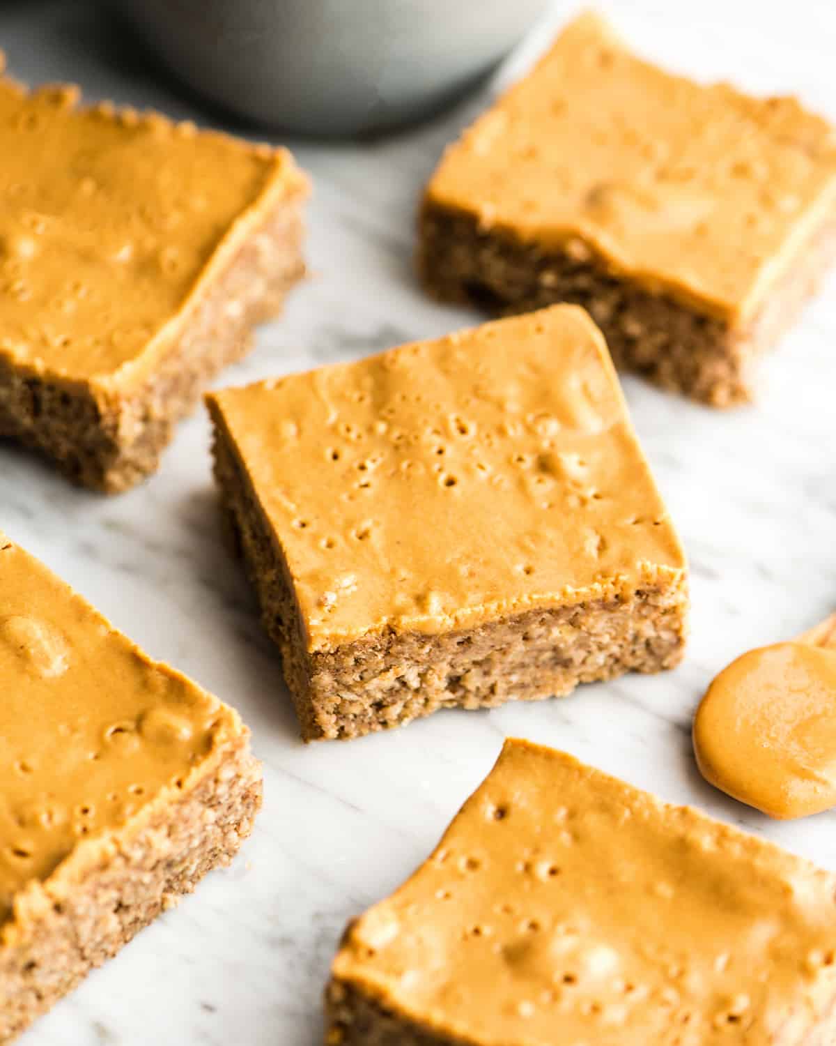 Overhead view of five healthy breakfast bars cut into squares